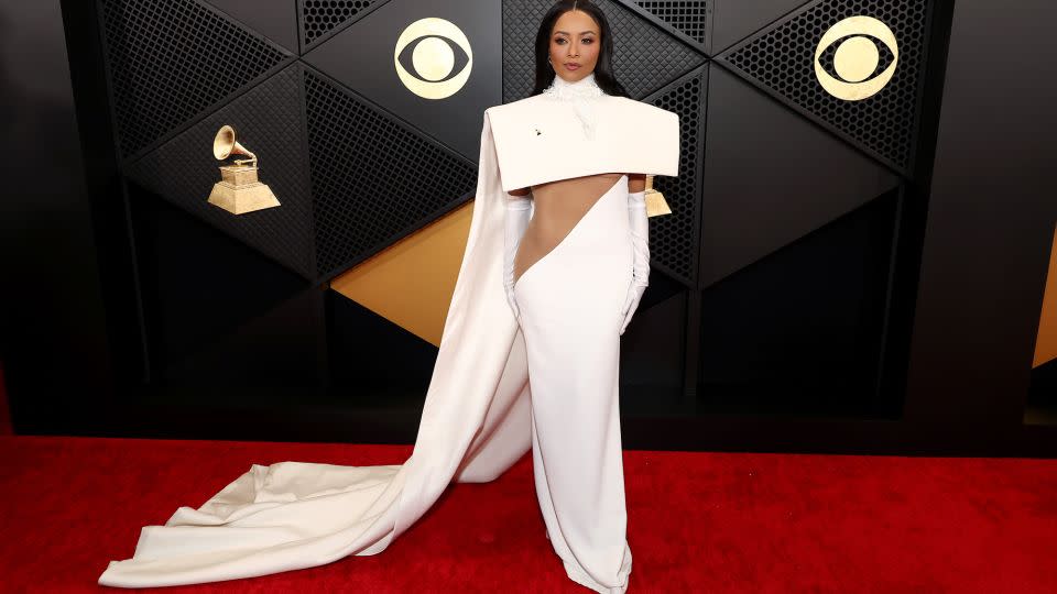 Actor and singer Kat Graham arrived in a cream-colored dress with a structured cape from Stéphane Rolland’s Fall-Winter 2023 Couture collection. - Matt Winkelmeyer/Getty Images