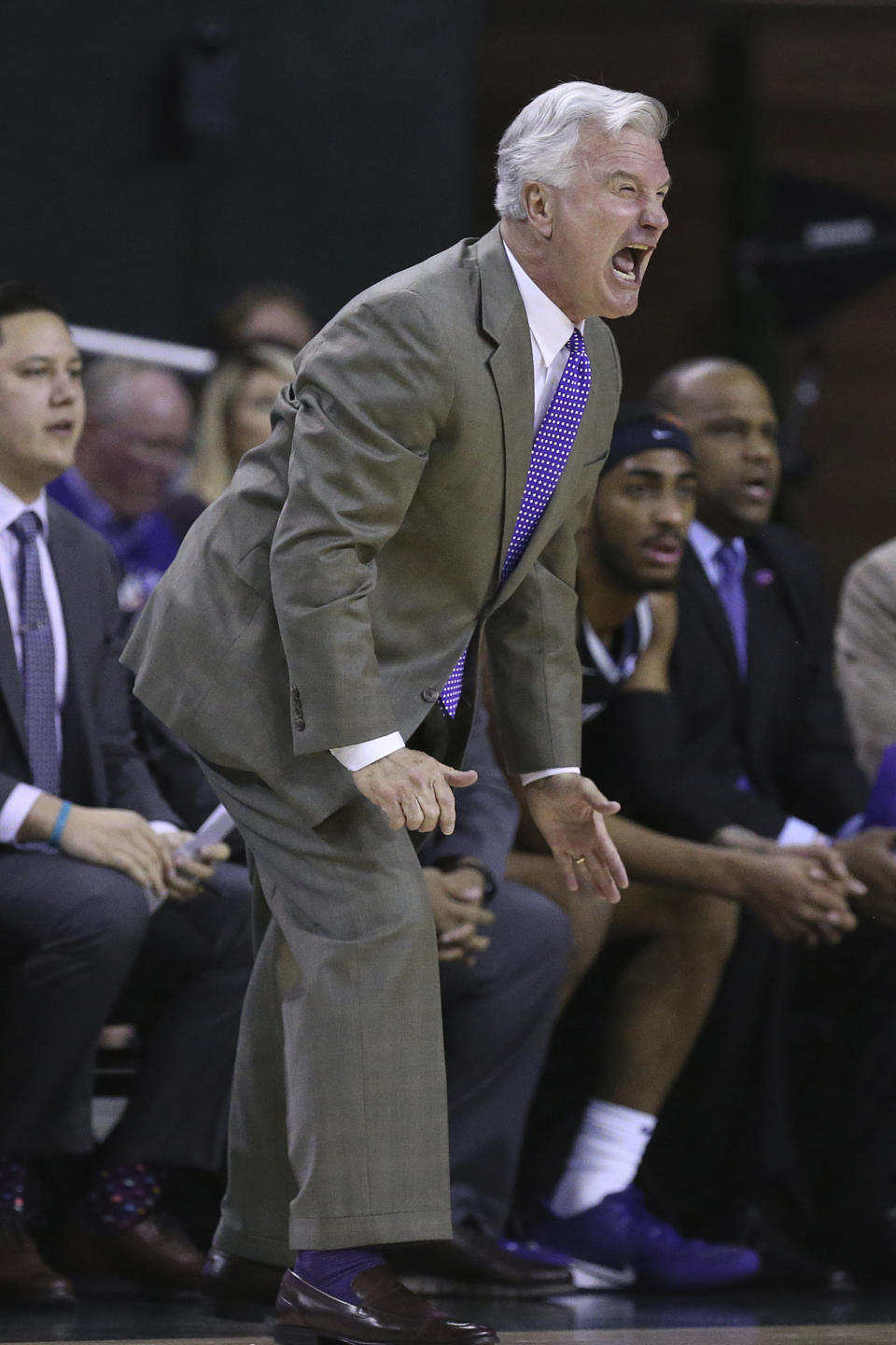 Kansas State head coach Bruce Weber calls to his players in the first half of an NCAA college basketball game against Baylor, Tuesday, Feb. 25, 2020, in Waco, Texas. (AP Photo/ Jerry Larson)