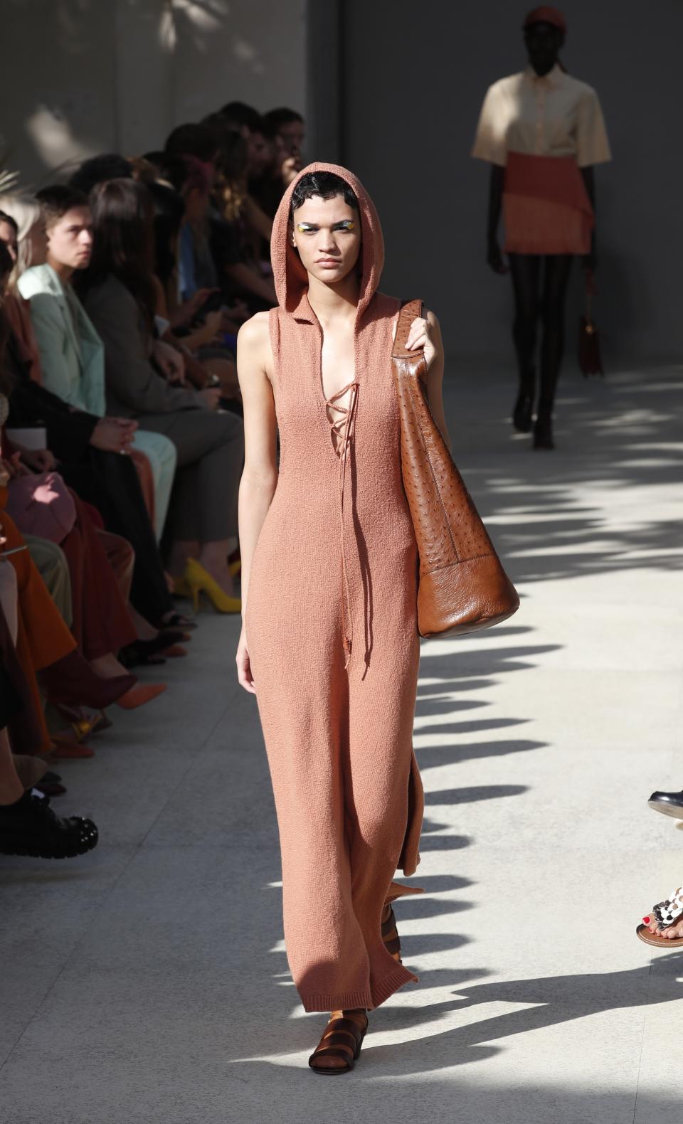 A model wears a creation as part of the Salvatore Ferragamo Spring-Summer 2020 collection, unveiled during the fashion week, in Milan, Italy, Saturday, Sept. 21, 2019. (AP Photo/Antonio Calanni)