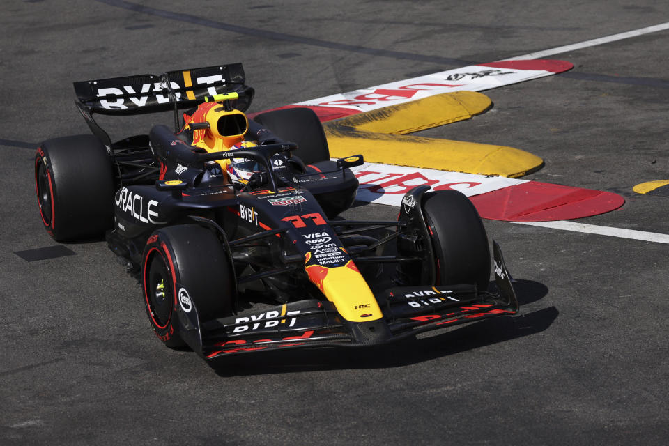 Red Bull driver Sergio Perez of Mexico steers his car during the qualifying session ahead of the Formula One Monaco Grand Prix at the Monaco racetrack, in Monaco, Saturday, May 25, 2024. (Claudia Greco/Pool Photo via AP)