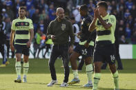 Manchester City's head coach Pep Guardiola talks with Manuel Akanji at the end of the English Premier League soccer match between Leicester City and Manchester City at King Power stadium in Leicester, England, Saturday, Oct. 29, 2022. (AP Photo/Rui Vieira)