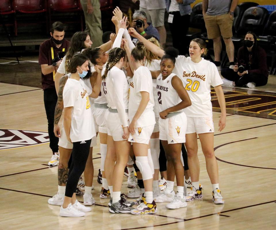 Arizona State huddles together ahead of their matchup against Minnesota at Desert Financial Arena on Nov. 12, 2021.