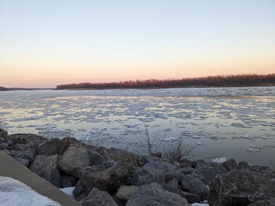 So-called "pancake ice" floats on the Mississippi River near Cape Girardeau, Missouri. Such ice formations are rare this far south, but a freeze and warm-up further north caused it to float downriver.