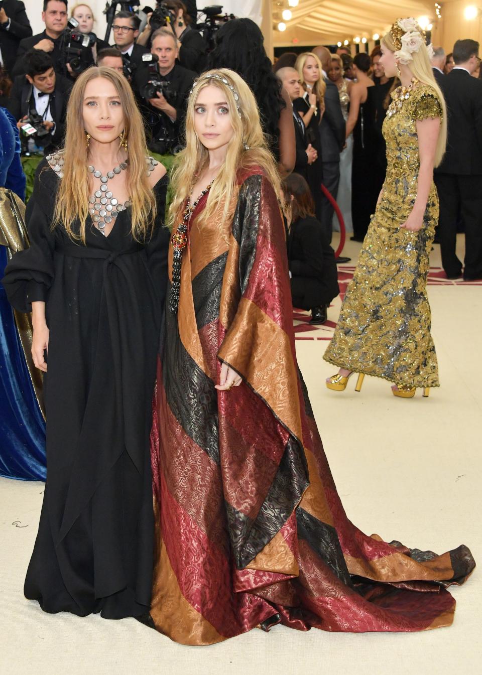 Mary-Kate and Ashley in vintage Paco Rabanne at the 2018 “Heavenly Bodies” Met Gala.