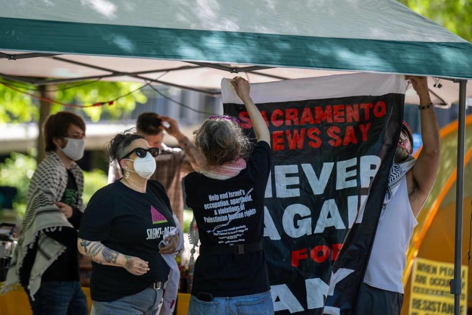 Jessica Lawless, second from left, of Jewish Voices for Peace, joins other activists in a pro-Palestinian demonstration on Monday at Sacramento State to protest the war in Gaza. “I’m working in alignment with many anti-Zionist Jews to support Palestinian activists and Muslim activists working to do their best to intervene, from far away, in the genocide in Gaza,” Lawless said.