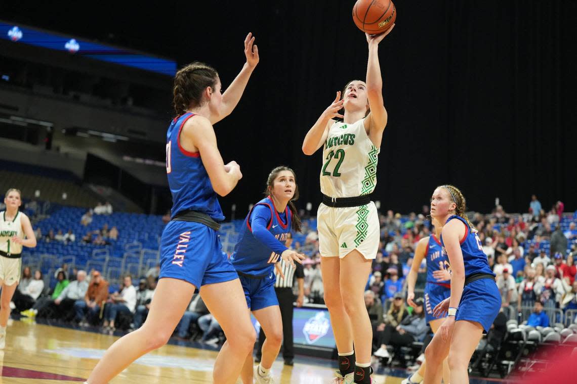 Newcastle’s Mattie Dollar (22), the Championship Game MVP, goes up for two of her 24 points in the Class 1A state championship game on Saturday, March 2, 2024 at the Alamodome in San Antonio, Texas. Newcastle defeated Turkey Valley 48-32.