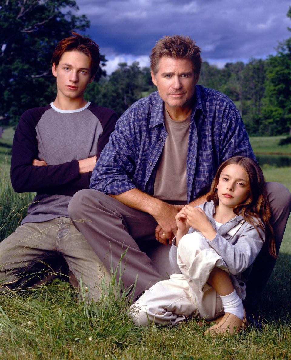 Actors Gregory Smith, Treat Williams, and Vivien Cardone in a promotional photo for season 1 of "Everwood"