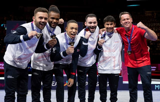  Great Britain celebrate winning all-round team gold at the European Championships