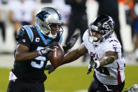 Carolina Panthers quarterback Teddy Bridgewater looks to pass under pressure from Atlanta Falcons defensive end Dante Fowler Jr. during the first half of an NFL football game Thursday, Oct. 29, 2020, in Charlotte, N.C. (AP Photo/Gerry Broome)