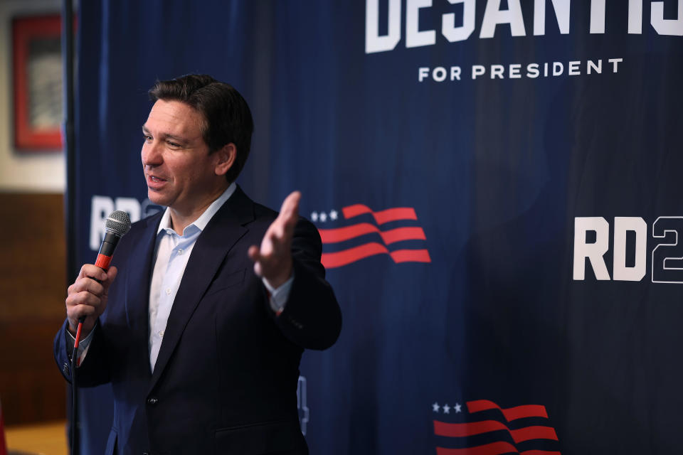 Republican presidential candidate Florida Governor Ron DeSantis speaks to guest during a campaign event at the Machine Shed restaurant on November 07, 2023 in Davenport, Iowa. / Credit: / Getty Images