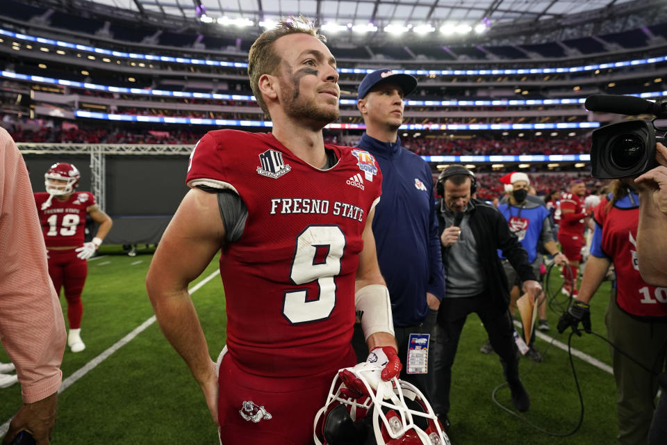 Fresno State quarterback Jake Haener (9) walks on the field after winning the LA Bowl 29-6 against Washington State in Inglewood, Calif., Saturday, Dec. 17, 2022. (AP Photo/Ashley Landis)