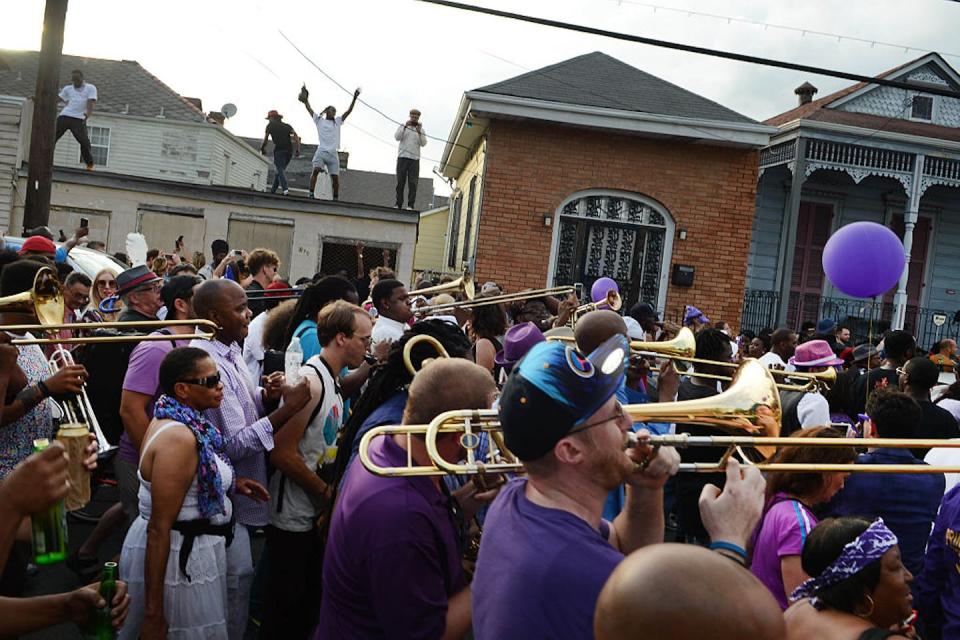 In Tremé, New Orleans, nearly half of all dwellings have become short-term rental properties. <a href="https://www.gettyimages.com/detail/news-photo/crowd-estimated-at-between-1500-and-2000-people-celebrates-news-photo/525178984?adppopup=true" rel="nofollow noopener" target="_blank" data-ylk="slk:Leon Morris/Redferns via Getty Images;elm:context_link;itc:0;sec:content-canvas" class="link ">Leon Morris/Redferns via Getty Images</a>