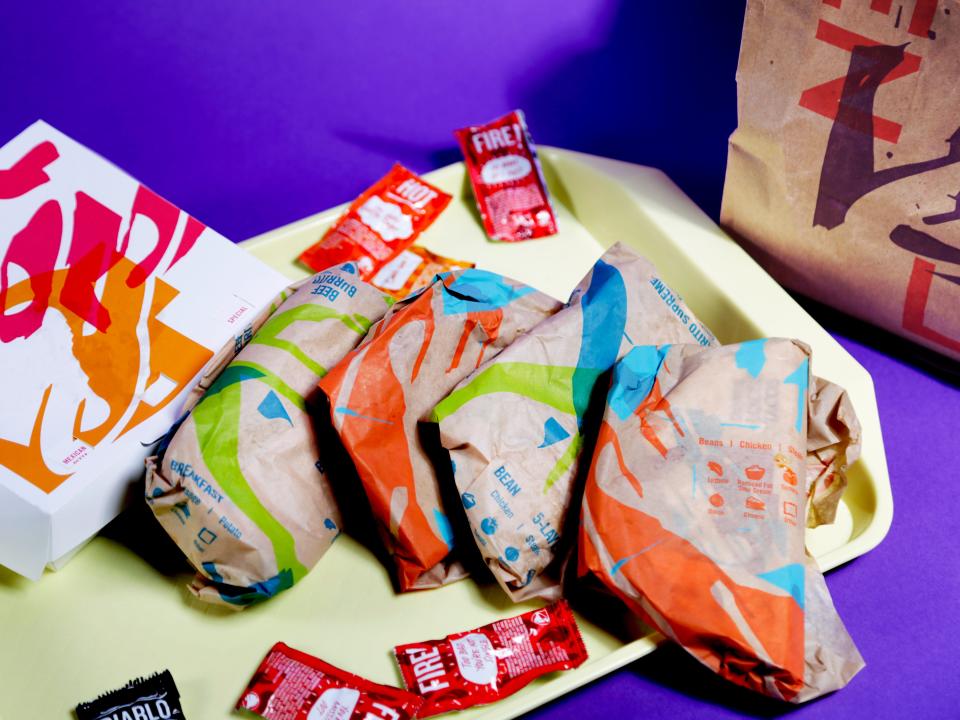 Taco Bell food items played out on food tray.