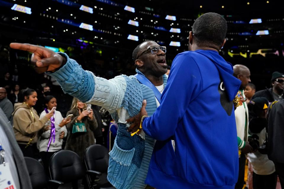 Shannon Sharpe and Tee Morant confront one another after Sharpe got into a verbal courtside altercation with the Memphis Grizzlies during their game at the Los Angeles Lakers on Jan. 20, 2023.