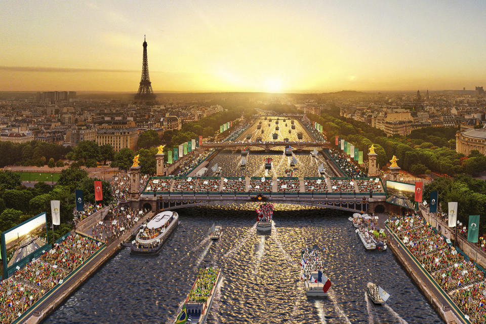 This computer generated image provided Tuesday May 23, 2023 by Paris 2024 shows an aerial view of Paris with the Eiffel tower and the Seine river during the opening ceremony of the Paris 2024 Olympic Games on July 26, 2024. French security experts have expressed misgivings about size and complexity of the security operation that will be needed to safeguard Paris' ambitions for the unprecedented opening gala along the River Seine. (Paris 2024 via AP)