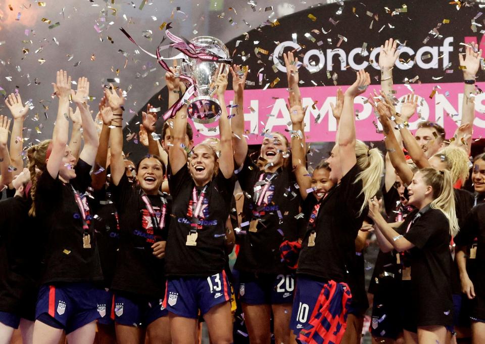 The US Women's National Team celebrates winning the CONCACAF W Championship.