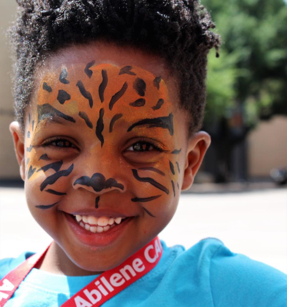 Thurmond Metters Jr., 4, got his tiger on for a trip downtown for the 2019 CALF.