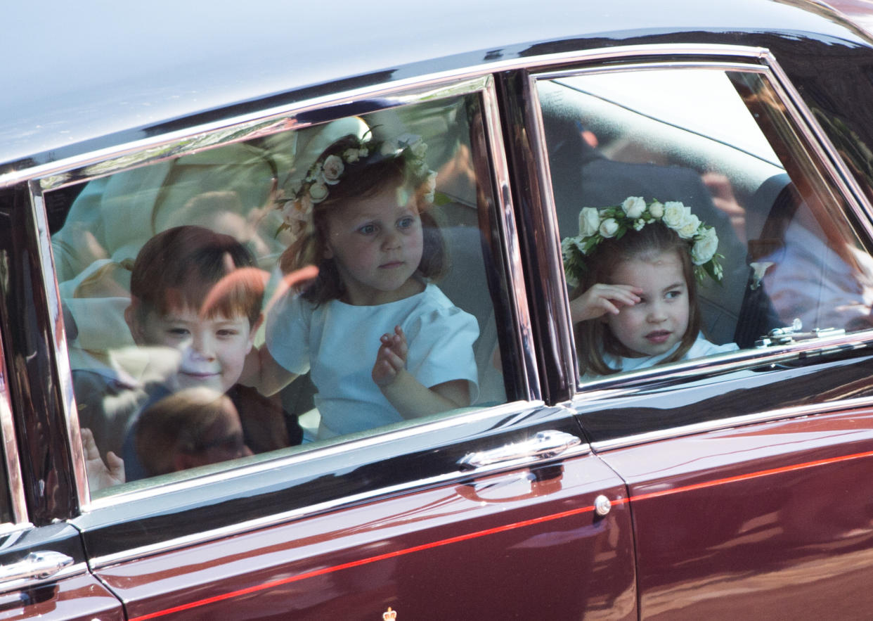 Jasper Dyer, Princess Charlotte (right) and Florence van Cutsem get ready for their wedding duties.