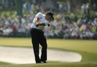 Phil Mickelson of the U.S. hits on the first fairway during first round play of the Masters golf tournament at the Augusta National Golf Course in Augusta, Georgia April 9, 2015. REUTERS/Brian Snyder