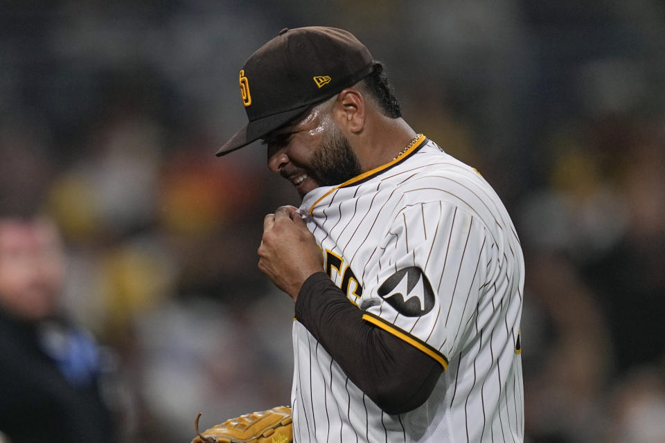 San Diego Padres starting pitcher Pedro Avila reacts as he walks to the dugout after the third out during the third inning of a baseball game against the San Francisco Giants, Thursday, Aug. 31, 2023, in San Diego. (AP Photo/Gregory Bull)