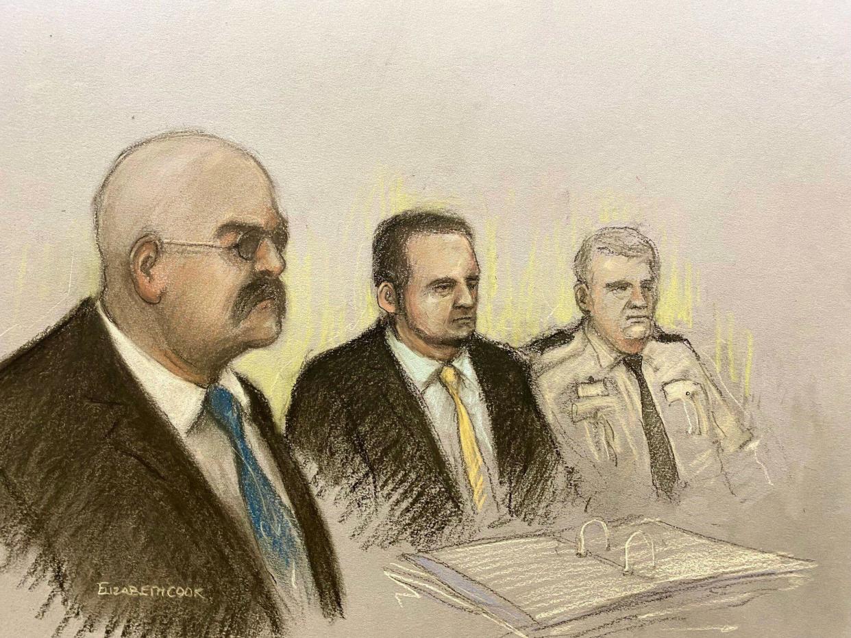 Court artist sketch by Elizabeth Cook of notorious inmate Charles Bronson (left), appearing via video link from HMP Woodhill, during his public parole hearing at the Royal Courts Of Justice, London.