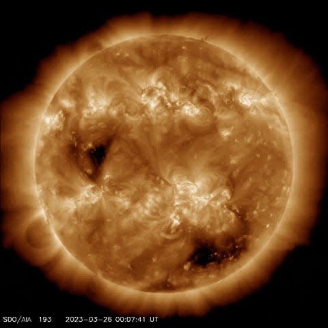 Solar coronal hole is shown on this gif of a rotating Earth.