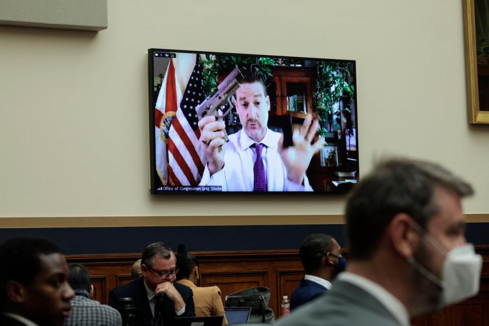 Rep. Greg Steube (R-FL) demonstrates assembling his handgun as he speaks remotely during a House Judiciary Committee mark up hearing in the Rayburn House Office Building on June 02, 2022 in Washington, DC (Getty Images)