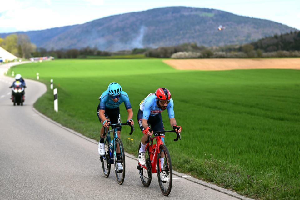 LA CHAUXDEFONDS SWITZERLAND  APRIL 27 LR Gleb Brussenskiy of Kazakhstan and Astana Qazaqstan Team and Julien Bernard of France and Team TrekSegafredo  Blue mountain jersey compete in the breakaway during the 76th Tour De Romandie 2023 Stage 2 a 1627km stage from Morteau to La ChauxdeFonds  UCIWT  on April 27 2023 in La ChauxdeFonds Switzerland Photo by Dario BelingheriGetty Images