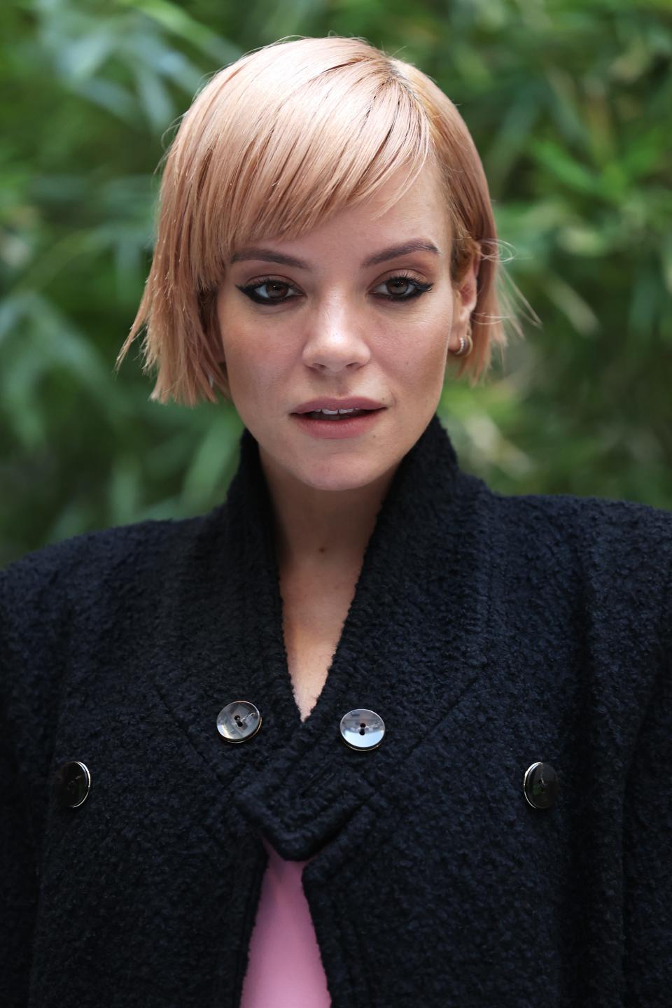 Lily Allen is calling out a rape joke at her expense made by comedians Russell Brand and others in 2007.