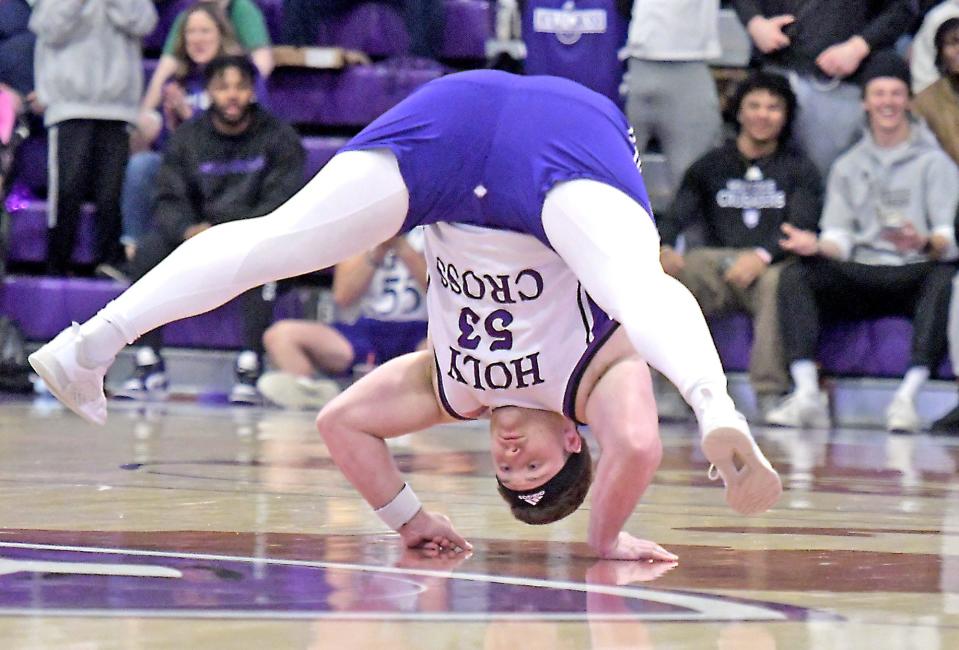 Holy Cross football team member Christo Kelly won the Irish Dance contest during intermission of the Patriot League women's basketball final between HC and Boston University.