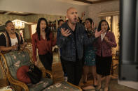 This image released by Universal Pictures shows Jo Koy, center, in "Easter Sunday." (Ed Araquel/Universal Pictures via AP)