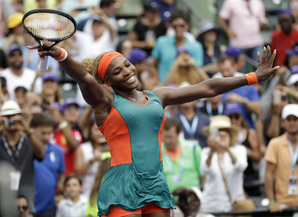 Serena Williams celebrates after defeating Li Na, of China, 7-5, 6-1 in the women's final at the Sony Open Tennis tournament, Saturday, March 29, 2014, in Key Biscayne, Fla. (AP Photo/Alan Diaz)