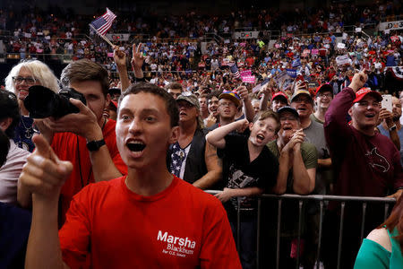 Fans cheer as U.S. President Donald Trump holds a Make America Great Again rally at Nashville Municipal Auditorium in Nashville, Tennessee, U.S., May 29, 2018. REUTERS/Leah Millis