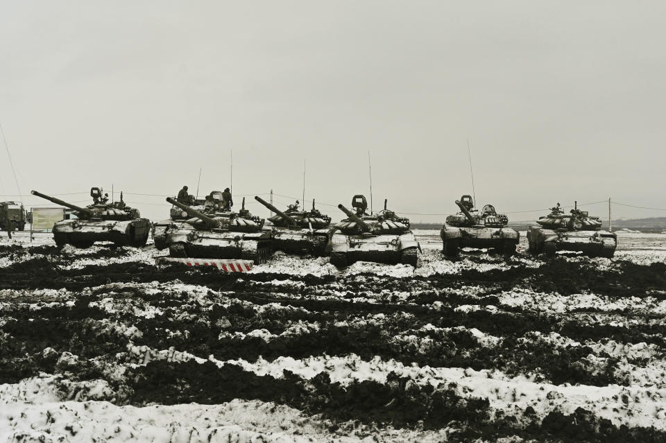 Russian tanks T-72B3 take part in drills at the Kadamovskiy firing range in the Rostov region in southern Russia, Wednesday, Jan. 12, 2022. Russia has rejected Western complaints about its troop buildup near Ukraine, saying it deploys them wherever it deems necessary on its own territory. (AP Photo)