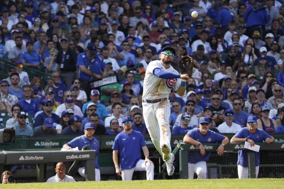 Chicago Cubs third baseman Nick Madrigal throws out Arizona Diamondbacks Jace Peterson during the seventh inning of a baseball game, Sunday, Sept. 10, 2023, in Chicago. (AP Photo/David Banks)