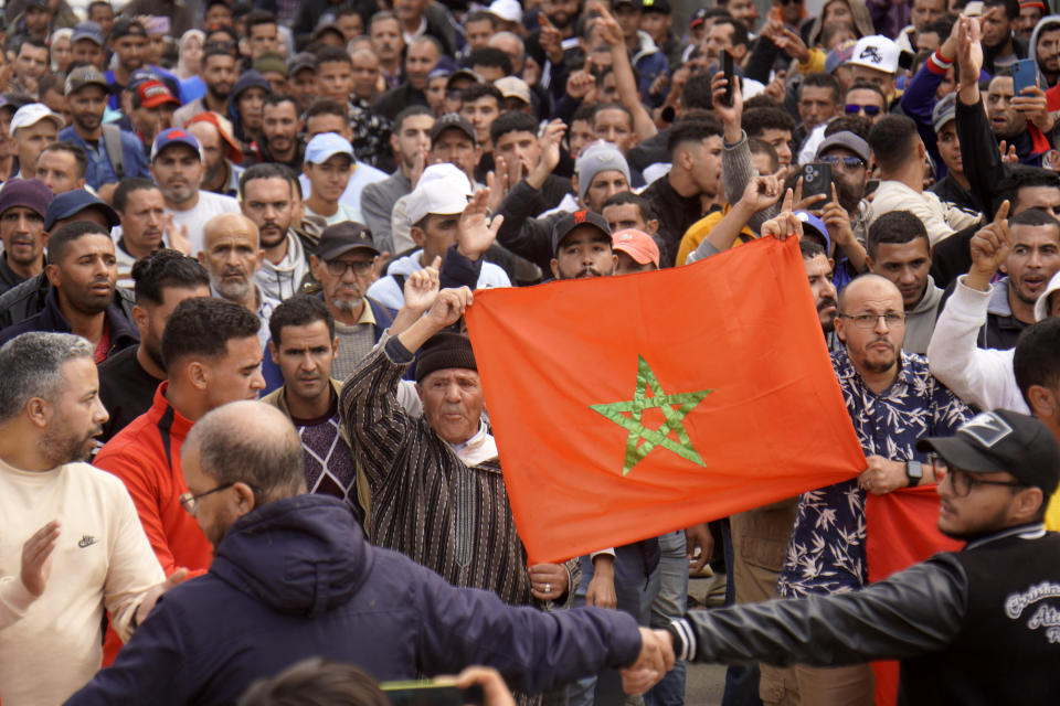 People displaced by the earthquake protest against lack of emergency assistance and worsening housing condition, in Amizmiz, outside Marrakech, Morocco, Tuesday, Oct. 24, 2023. (AP Photo/Youssef Mazouz)