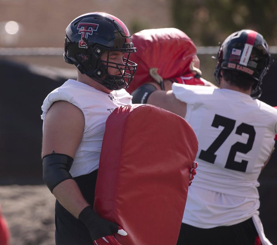 Texas Tech's Vinny Sciury pauses during a drill at a spring football practice, Thursday, March 21, 2024, at Sports Performance Center.