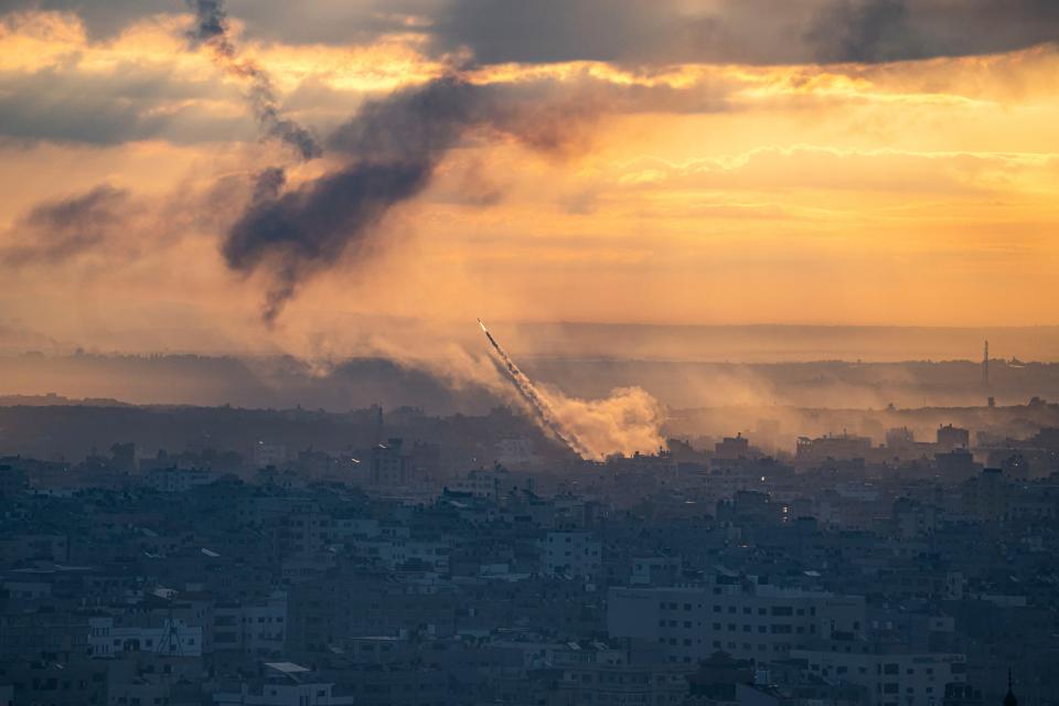 Rockets are fired toward Israel from the Gaza Strip, Saturday, Oct. 7, 2023. The rockets were fired as Hamas announced a new operation against Israel.