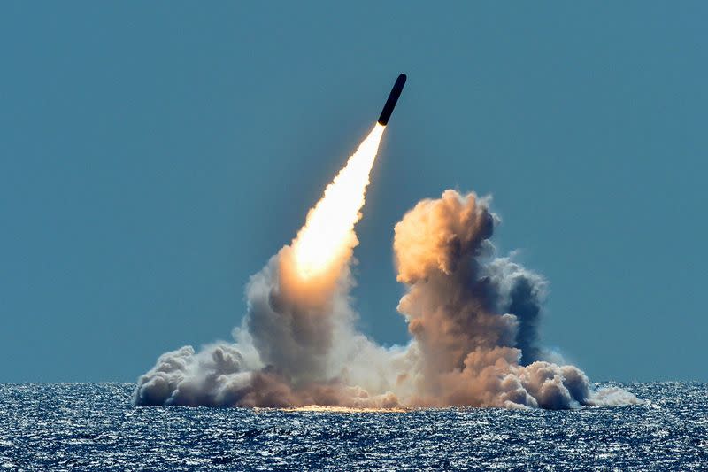 FILE PHOTO: An unarmed Trident II D5 missile is test-launched from the ballistic missile submarine USS Nebraska