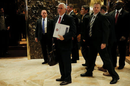 Vice President-elect Mike Pence arrives to meet with U.S. President-elect Donald Trump at Trump Tower in New York, U.S., November 28, 2016. REUTERS/Mike Segar