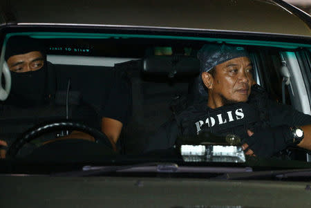 Members of the Royal Malaysia Police special operation forces leave the morgue at Kuala Lumpur General Hospital where Kim Jong Nam's body is held for autopsy in Malaysia, February 21, 2017. REUTERS/Athit Perawongmetha