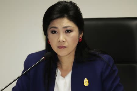 Prime Minister Yingluck Shinawatra attends her cabinet economic meeting at the office of the Permanent Secretary of Defense in Bangkok April 21, 2014. REUTERS/stringer