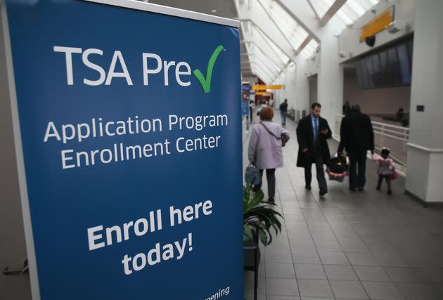 TSA PreCheck allows travelers to keep their shoes, belt and light outwear on, and leave any laptops and small containers of liquid inside their bags during the security screening process. (Photo: John Moore via Getty Images)