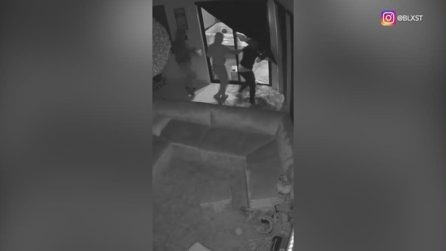 Video posted by rapper Blxst shows three suspects breaking into his Encino home. (IG/@blxst)