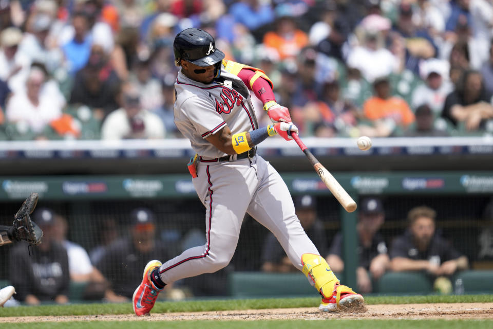 Atlanta Braves' Ronald Acuna Jr. hits a one-run single against the Detroit Tigers in the fourth inning during the first baseball game of a doubleheader, Wednesday, June 14, 2023, in Detroit. (AP Photo/Paul Sancya)