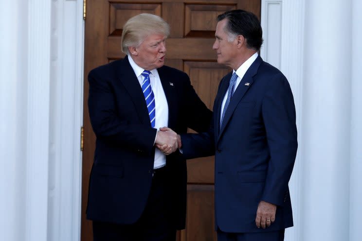 Donald Trump shakes hands with Mitt Romney after their meeting at Trump National Golf Club in Bedminster, N.J. (Photo: Mike Segar/Reuters)