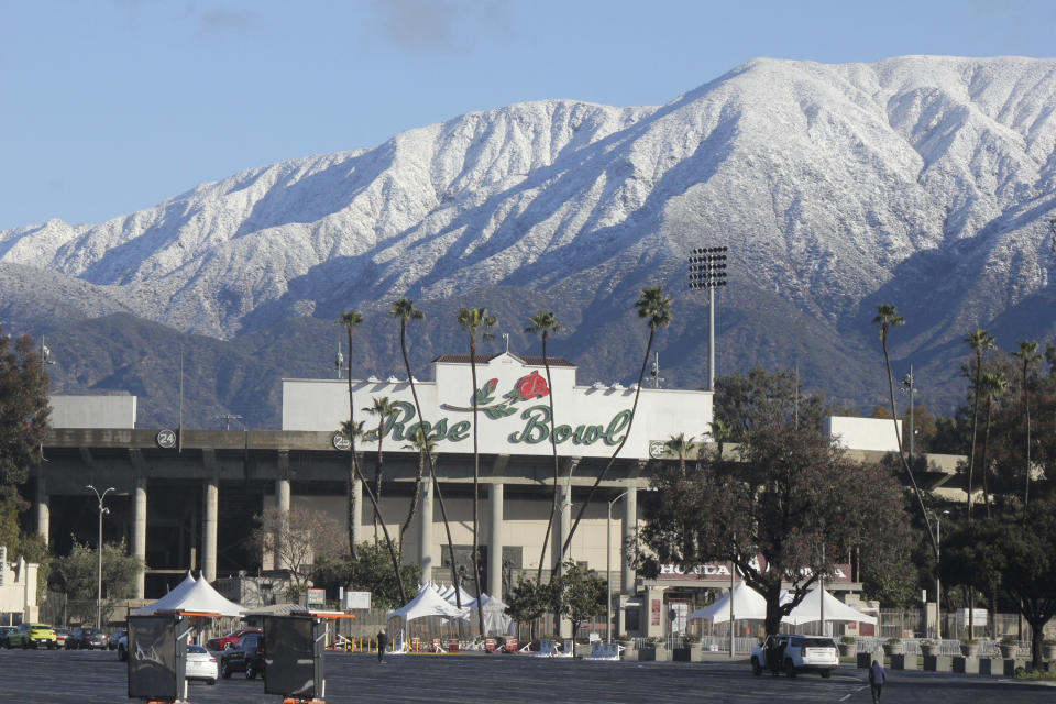 Snow caps the San Gabriel Mountains above the Rose Bowl Stadium in Pasadena, Calif., on Sunday, Feb. 26, 2023, after a major winter storm swept through the state. (AP Photo / John Antczak)