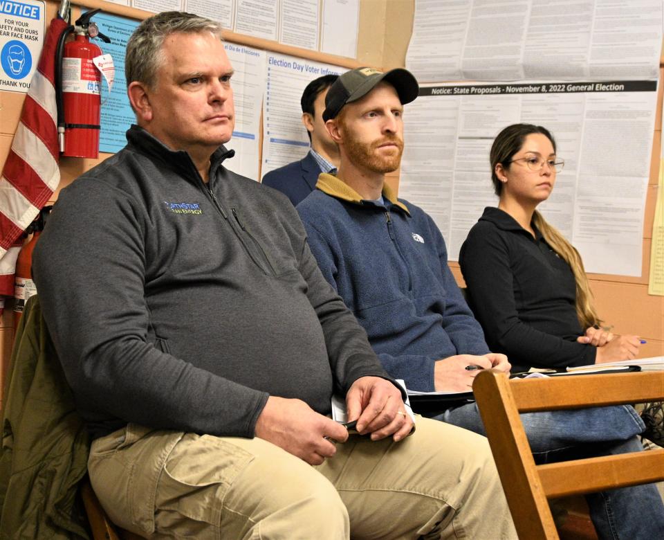 Tim Gehring of NorthStar Clean Energy  (left) with others from the solar project developers answered questions for the Bethel Township zoning commission Monday night.