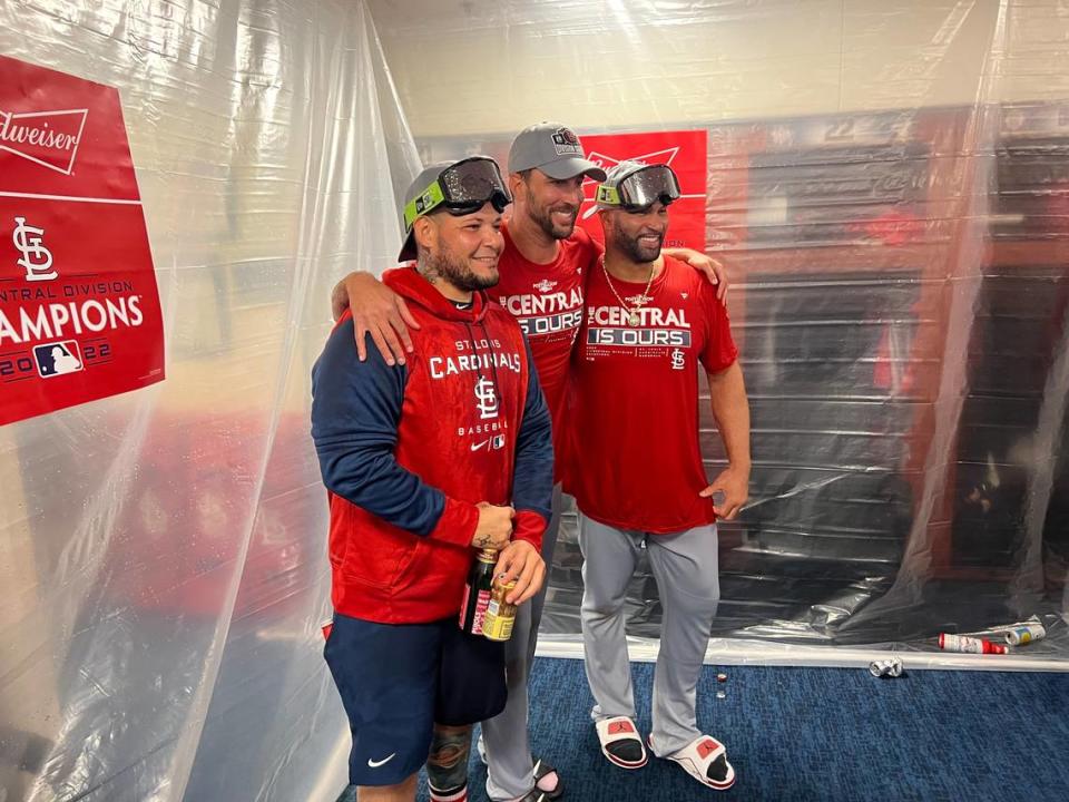 St. Louis Cardinals stars Yadier Molina, Adam Wainwright and Albert Pujols are all smiles following the team’s 6-2 win against Milwaukee on Tuesday night. The victory secured the organization’s 12th Central Division crown.