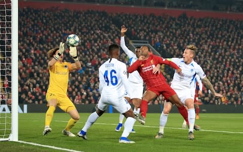 Georginio Wijnaldum of Liverpool scores their 1st goal - Credit: Simon Stacpoole/Offside/Offside via Getty Images